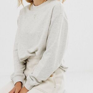 Monki classic sweatshirt with heart logo in beige